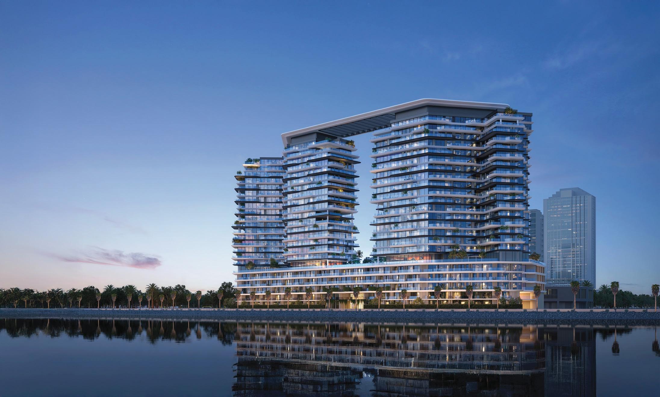 Aerial view of Seamont Collection Residences on Reem Island, showcasing twin waterfront towers with rooftop amenities and surrounding urban landscape